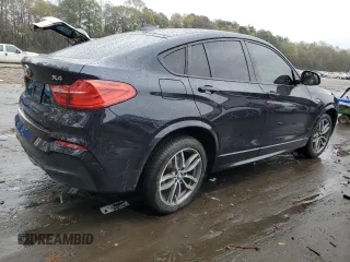 2016 BMW X4 xDrive28i with VIN 5UXXW3C59G0R20451, listed as a Copart auction lot 76909023 with 96,076 mi miles. Bid and sale history available at carsss.com. Image 3.