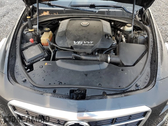 2014 Cadillac CTS Luxury AWD z VIN 1G6AX5S31E0156448, wystawiony jako Copart lot #51983215 z przebiegiem 112 630 mil mil oraz Szkoda całkowita • Salvage title. Historia ofert i sprzedaży dostępna na DreamBid. Obrazek 11.