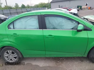 2015 Chevrolet Sonic LT with VIN 1G1JC5SB8F4168860, listed as a IAAI auction lot 42163278 with 102,855 mi miles and . Bid and sale history available at DreamBid. Image 13.