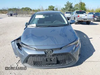 2022 Toyota Corolla LE with VIN JTDEPMAE1NJ200552, listed as a IAAI auction lot 40465421 with 62,929 mi miles. Bid and sale history available at carsss.com. Image 12.