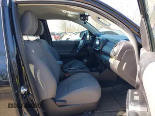 2023 Toyota Tacoma SR with VIN 3TYRX5GN9PT075342, listed as a IAAI auction lot 41652456 with 9,690 mi miles and . Bid and sale history available at DreamBid. Image 5.