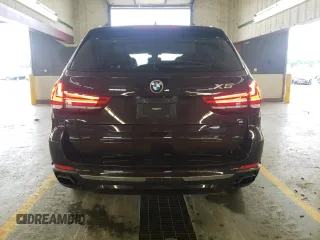 2016 BMW X5 xDrive50i with VIN 5UXKR6C51G0J80011, listed as a Copart auction lot 66155613 with 97,921 mi miles and Clean Title. Bid and sale history available at carsss.com. Image 6.