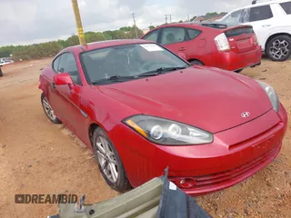 2008 Hyundai Tiburon GS z VIN KMHHM66D68U277885, wystawiony jako IAAI lot #42172920 z przebiegiem 205 023 mil mil oraz . Historia ofert i sprzedaży dostępna na DreamBid. Obrazek 1.
