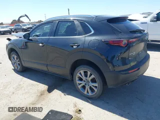 2022 Mazda CX-30 S Select z VIN 3MVDMBBL7NM413447, wystawiony jako IAAI lot #41772804 z przebiegiem 69 102 mil mil oraz . Historia ofert i sprzedaży dostępna na DreamBid. Obrazek 3.