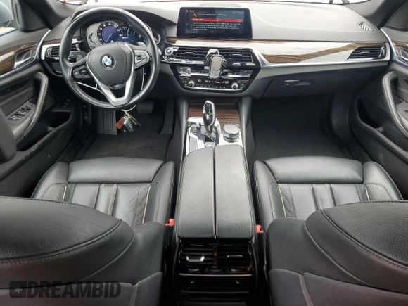 2019 BMW 5 Series 530e xDrive with VIN WBAJB1C56KB375312, listed as a Copart auction lot 52709125 with 63,422 mi miles and Salvage title. Bid and sale history available at DreamBid. Image 8.