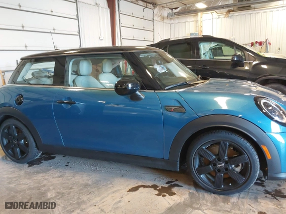 2024 MINI Hardtop 2 Door Cooper S with VIN WMW53DH08R2U74513, listed as a IAAI auction lot 40993803 with 7,817 mi miles. Bid and sale history available at carsss.com. Image 14.