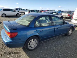 2000 Saturn SL z VIN 1G8ZK5279YZ155916, wystawiony jako Copart lot #44225105 z przebiegiem 97 788 mil mil oraz Szkoda całkowita • Salvage title. Historia ofert i sprzedaży dostępna na DreamBid. Obrazek 3.
