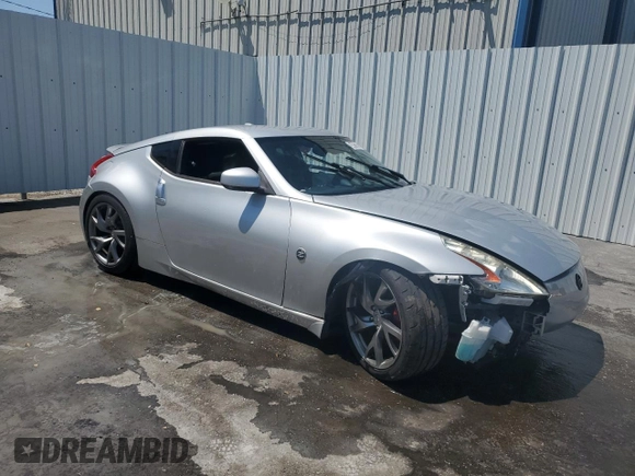 2016 Nissan 370Z Sport с VIN JN1AZ4EH9GM934860, выставлен на аукционе Copart как лот 54613555 с пробегом Не указан миль и Чистый • Clean title. История ставок и продаж доступна на DreamBid. Изображение 4.