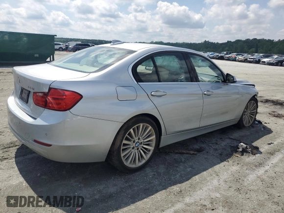 2014 BMW 3 Series 328i with VIN WBA3A5C50EP602567, listed as a Copart auction lot 57306085 with 117,561 mi miles and Salvage title. Bid and sale history available at DreamBid. Image 3.