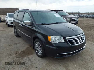 2014 Chrysler Town & Country Touring-L with VIN 2C4RC1CG6ER176156, listed as a IAAI auction lot 42008100 with 139,519 mi miles. Bid and sale history available at carsss.com. Image 1.