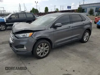2021 Ford Edge Titanium with VIN 2FMPK4K96MBA16599, listed as a Copart auction lot 53920735 with 71,376 mi miles and Salvage title. Bid and sale history available at DreamBid. Image 1.
