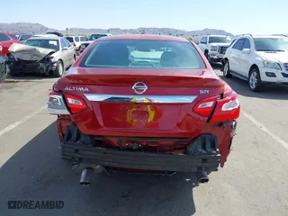 2016 Nissan Altima 2.5 SL with VIN 1N4AL3AP4GC122089, listed as a IAAI auction lot 41965851 with 121,608 mi miles. Bid and sale history available at carsss.com. Image 17.
