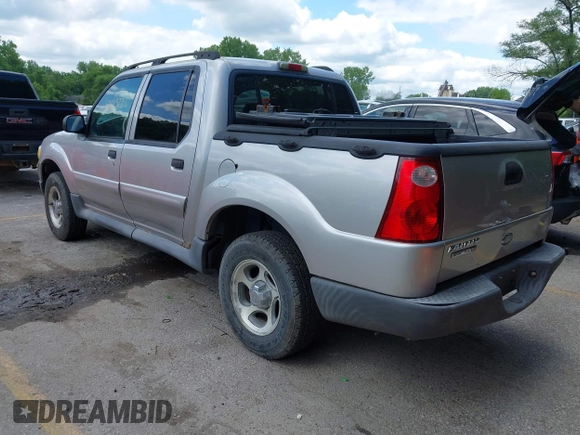 2005 Ford Explorer Sport Trac XLS z VIN 1FMZU77K75UB52008, wystawiony jako IAAI lot #42103222 z przebiegiem 196 605 mil mil oraz . Historia ofert i sprzedaży dostępna na DreamBid. Obrazek 3.