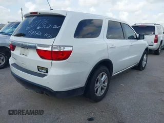 2013 Dodge Durango SXT with VIN 1C4RDHAG4DC667776, listed as a IAAI auction lot 42656299 with 204,181 mi miles and . Bid and sale history available at DreamBid. Image 4.