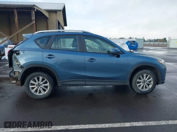 2015 Mazda CX-5 Sport with VIN JM3KE4BY0F0507727, listed as a IAAI auction lot 41249151 with 95,343 mi miles. Bid and sale history available at carsss.com. Image 14.