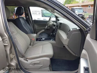 2005 Jeep Grand Cherokee Laredo with VIN 1J4GR48K35C510327, listed as a IAAI auction lot 42026081 with 260,377 mi miles. Bid and sale history available at carsss.com. Image 5.