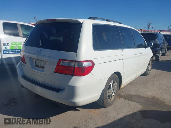 2006 Honda Odyssey EX with VIN 5FNRL38426B400952, listed as a IAAI auction lot 41346853 with 210,826 mi miles and . Bid and sale history available at DreamBid. Image 4.