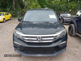 2016 Honda Pilot EX-L with VIN 5FNYF6H59GB100369, listed as a IAAI auction lot 42684252 with 146,609 mi miles and . Bid and sale history available at DreamBid. Image 12.