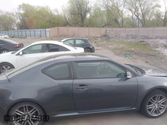 2013 Scion tC with VIN JTKJF5C76D3050374, listed as a IAAI auction lot 42024870 with 99,233 mi miles. Bid and sale history available at carsss.com. Image 14.