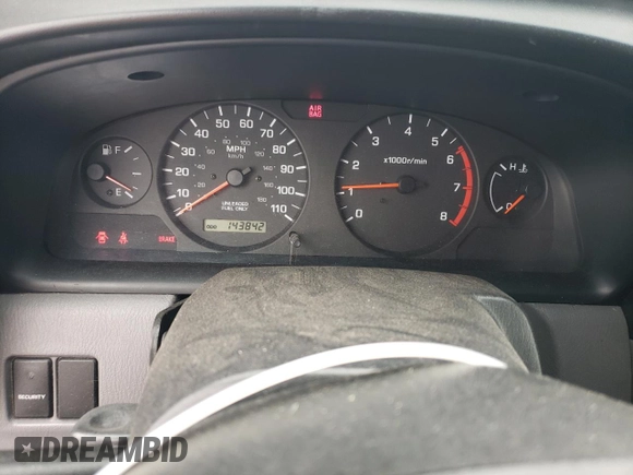 2000 Nissan Frontier XE with VIN 1N6ED27T8YC357939, listed as a Copart auction lot 55727395 with 143,842 mi miles and Salvage title. Bid and sale history available at DreamBid. Image 9.