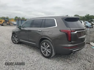 2020 Cadillac XT6 FWD Premium Luxury with VIN 1GYKPCRS4LZ133123, listed as a Copart auction lot 59411115 with 64,463 mi miles and Salvage title. Bid and sale history available at DreamBid. Image 2.