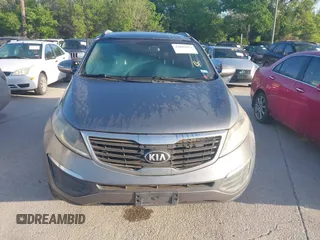 2013 Kia Sportage LX with VIN KNDPB3A26D7406680, listed as a IAAI auction lot 42004413 with 170,221 mi miles and . Bid and sale history available at carsss.com. Image 6.