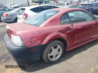 2003 Ford Mustang Standard z VIN 1FAFP40473F441647, wystawiony jako IAAI lot #42179189 z przebiegiem 138 460 mil mil oraz . Historia ofert i sprzedaży dostępna na DreamBid. Obrazek 6.