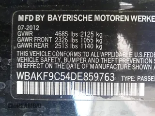 2013 BMW 3 Series 335i xDrive with VIN WBAKF9C54DE859763, listed as a IAAI auction lot 42253427 with 124,343 mi miles and . Bid and sale history available at DreamBid. Image 9.
