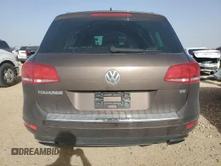 2013 Volkswagen Touareg Exec z VIN WVGEF9BP7DD009467, wystawiony jako Copart lot #47492725 z przebiegiem 109 511 mil mil oraz Szkoda całkowita • Salvage title. Historia ofert i sprzedaży dostępna na DreamBid. Obrazek 6.