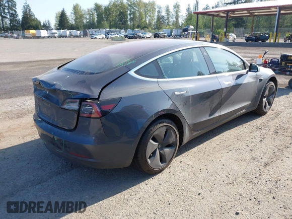 2018 Tesla Model 3 Long Range Battery with VIN 5YJ3E1EA1JF021139, listed as a IAAI auction lot 42116626 with 83,003 mi miles and . Bid and sale history available at DreamBid. Image 4.