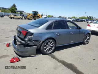 2016 Audi A4 Premium z VIN WAUAFAFL2GN016284, wystawiony jako Copart lot #56496125 z przebiegiem 102 552 mil mil oraz Szkoda całkowita • Salvage title. Historia ofert i sprzedaży dostępna na DreamBid. Obrazek 3.