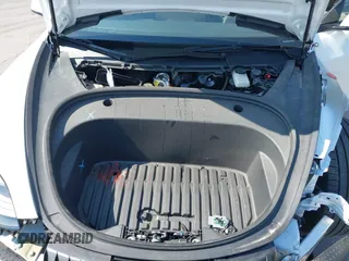 2023 Tesla Model 3 with VIN 5YJ3E1EA9PF585632, listed as a IAAI auction lot 40520993 with 7,775 mi miles and . Bid and sale history available at DreamBid. Image 10.