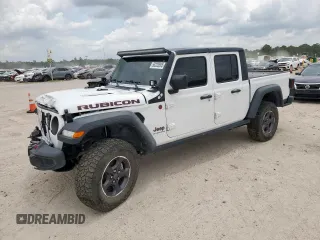 2023 Jeep Gladiator Rubicon with VIN 1C6JJTBG8PL532271, listed as a Copart auction lot 58220565 with 34,172 mi miles and Salvage title. Bid and sale history available at DreamBid. Image 1.