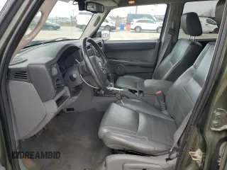 2006 Jeep Commander with VIN 1J8HG48K06C297654, listed as a Copart auction lot 51000155 with 126,235 mi miles and Salvage Title. Bid and sale history available at DreamBid. Image 7.