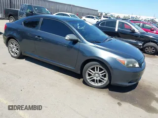 2007 Scion tC Spec with VIN JTKDE177170180779, listed as a IAAI auction lot 41987327 with 243,427 mi miles. Bid and sale history available at carsss.com. Image 1.