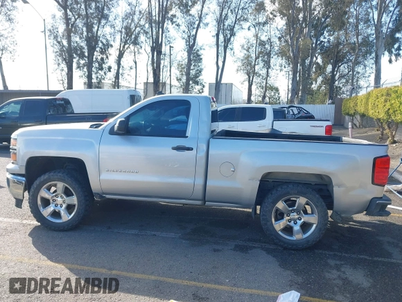 2014 Chevrolet Silverado 1500 with VIN 1GCNCREH2EZ303297, listed as a IAAI auction lot 41692877 with 115,621 mi miles and . Bid and sale history available at DreamBid. Image 14.
