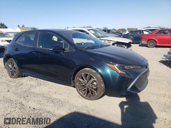 2019 Toyota Corolla Hatchback SE with VIN JTNK4RBEXK3029190, listed as a Copart auction lot 71320434 with 54,665 mi miles and Salvage Title. Bid and sale history available at carsss.com. Image 4.