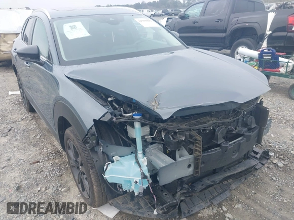 2023 Mazda CX-30 S Carbon Edition with VIN 3MVDMBCM5PM514304, listed as a IAAI auction lot 41795899 with 31,993 mi miles and . Bid and sale history available at DreamBid. Image 6.