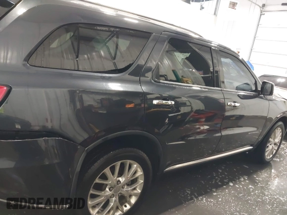 2014 Dodge Durango Citadel с VIN 1C4RDJEG9EC591992, выставлен на аукционе IAAI как лот 42571891 с пробегом 150 669 миль миль и . История ставок и продаж доступна на DreamBid. Изображение 13.
