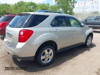 2014 Chevrolet Equinox LTZ z VIN 2GNFLDE33E6129917, wystawiony jako IAAI lot #42209167 z przebiegiem 190 445 mil mil oraz . Historia ofert i sprzedaży dostępna na DreamBid. Obrazek 4.