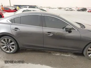2020 Mazda 6 Signature with VIN JM1GL1XY6L1522900, listed as a IAAI auction lot 41724818 with 62,846 mi miles and . Bid and sale history available at DreamBid. Image 13.