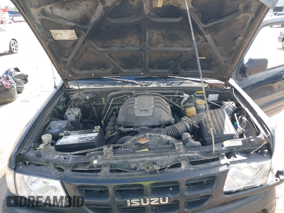 2001 Isuzu Rodeo S with VIN 4S2CK58W114363340, listed as a IAAI auction lot 41498698 with 185,408 mi miles and . Bid and sale history available at DreamBid. Image 10.
