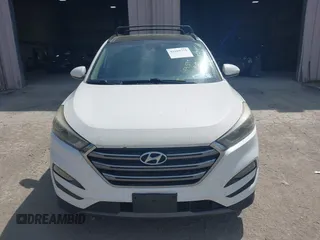 2016 Hyundai Tucson Eco with VIN KM8J3CA22GU076489, listed as a IAAI auction lot 42169732 with 153,597 mi miles. Bid and sale history available at carsss.com. Image 12.