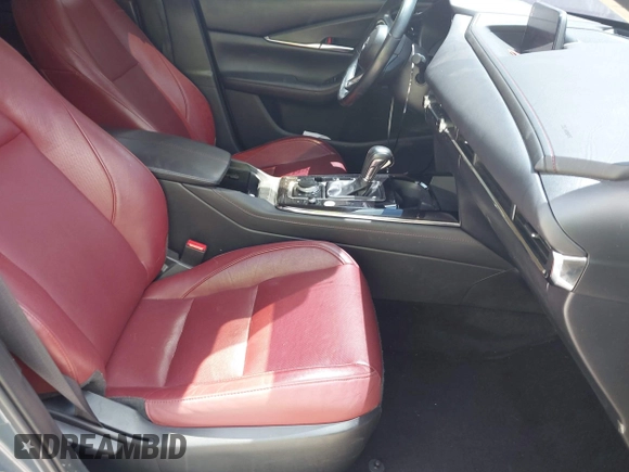 2024 Mazda CX-30 S Preferred with VIN 3MVDMBCM5RM648894, listed as a IAAI auction lot 42119860 with 23,857 mi miles and . Bid and sale history available at DreamBid. Image 5.