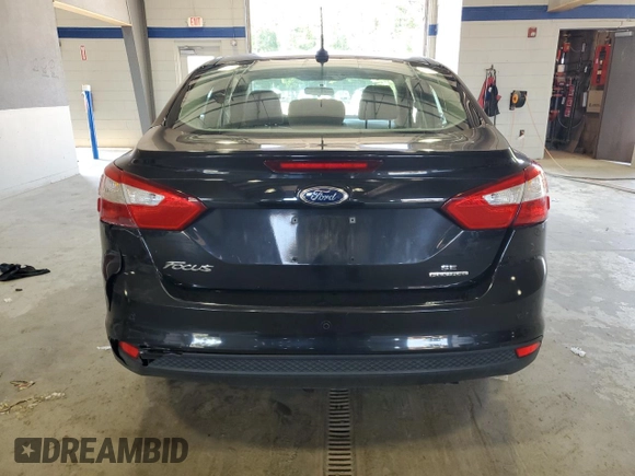 2013 Ford Focus SE with VIN 1FADP3F20DL330691, listed as a Copart auction lot 62855115 with 127,231 mi miles and Salvage title. Bid and sale history available at DreamBid. Image 6.