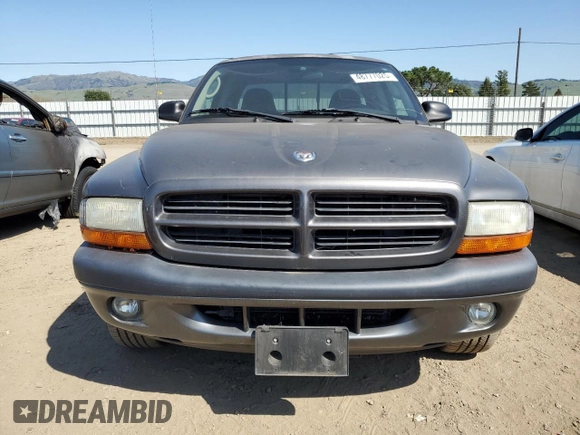 2002 Dodge Dakota z VIN 1B7GL32N62S551525, wystawiony jako Copart lot #48777025 z przebiegiem 91 438 mil mil oraz Czysty tytuł • Clean title. Historia ofert i sprzedaży dostępna na DreamBid. Obrazek 5.