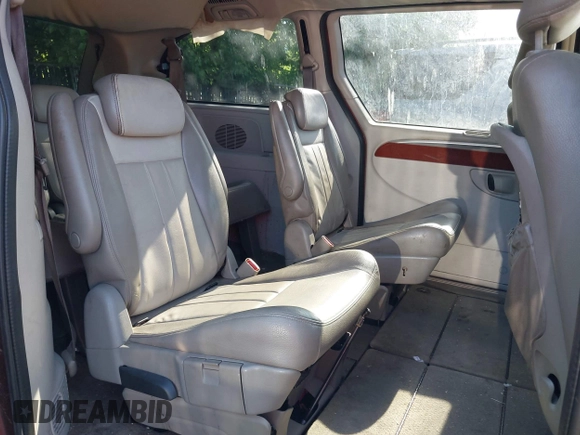 2007 Chrysler Town & Country Touring z VIN 2A4GP54L97R152073, wystawiony jako IAAI lot #42322594 z przebiegiem 152 292 mil mil oraz . Historia ofert i sprzedaży dostępna na DreamBid. Obrazek 8.