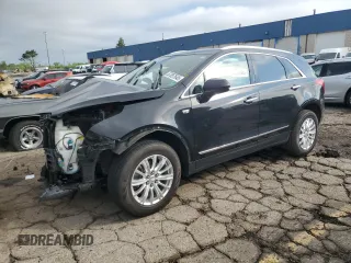 2019 Cadillac XT5 FWD with VIN 1GYKNARS6KZ169100, listed as a Copart auction lot 57057645 with 74,490 mi miles and Clean title. Bid and sale history available at DreamBid. Image 1.