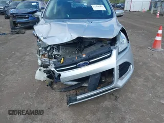 2015 Ford Escape Titanium z VIN 1FMCU9J99FUC75852, wystawiony jako IAAI lot #42171467 z przebiegiem 113 322 mil mil oraz . Historia ofert i sprzedaży dostępna na DreamBid. Obrazek 6.