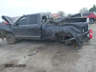 2015 GMC Sierra 1500 SLE z VIN 1GTV2UEC3FZ212843, wystawiony jako IAAI lot #42030130 z przebiegiem Nie podano mil oraz . Historia ofert i sprzedaży dostępna na DreamBid. Obrazek 14.
